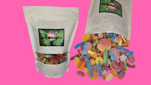 An assortment of fizzy and sour gummy sweets in a pouch in Plymouth